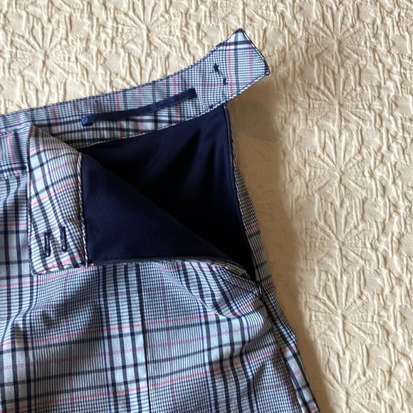 Plaid skort in blue black purple white and red with navy stretch shorts attached - Picture 7 of 13